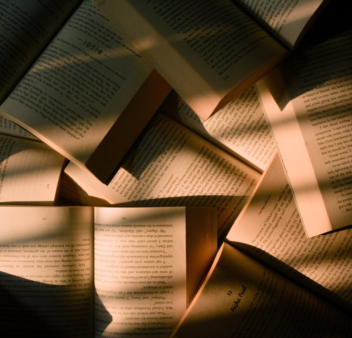 Open books on the floor