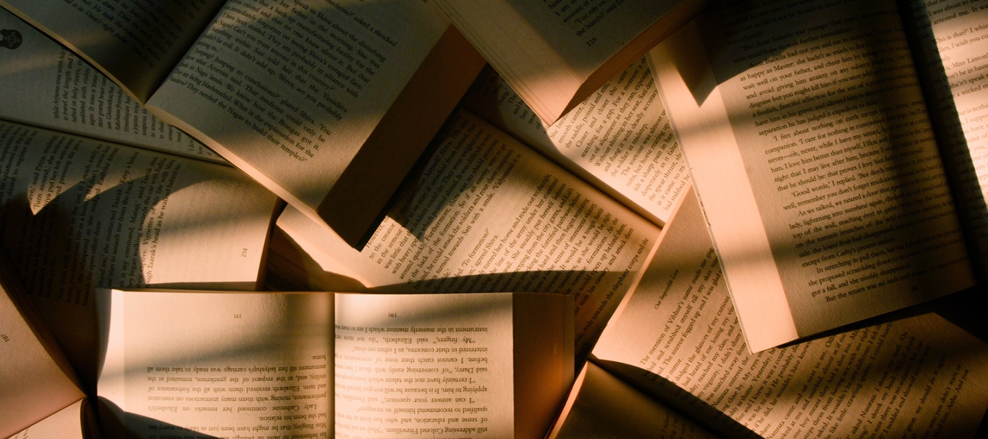 Open books on the floor